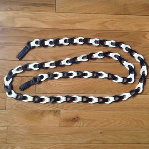 Black and white loop leather belt